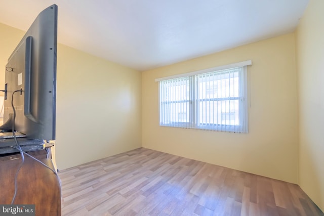 unfurnished room featuring light wood-type flooring