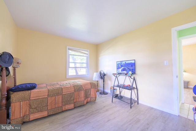 bedroom with light hardwood / wood-style flooring