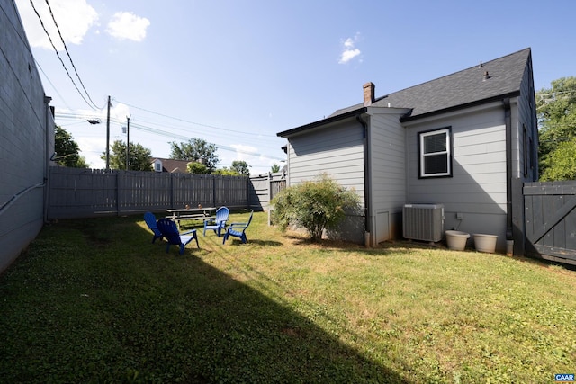 view of yard featuring central AC unit