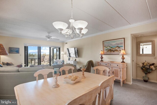 13700 Wight St Unit 1N01, Ocean City, MD 21842 - dining area featuring light carpet, baseboards, ceiling fan with notable chandelier, and ornamental molding