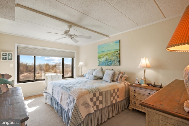 13700 Wight St Unit 1N01, Ocean City, MD 21842 - bedroom featuring a textured ceiling, light colored carpet, ceiling fan, and ornamental molding
