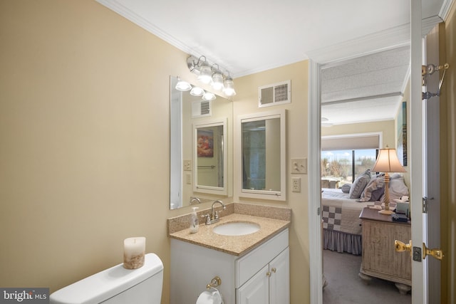 13700 Wight St Unit 1N01, Ocean City, MD 21842 - bathroom featuring ornamental molding, visible vents, toilet, and ensuite bath