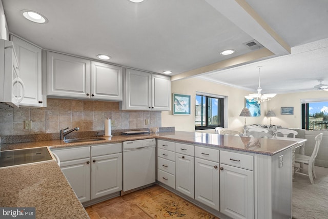 13700 Wight St Unit 1N01, Ocean City, MD 21842 - kitchen with a sink, white appliances, visible vents, and a wealth of natural light