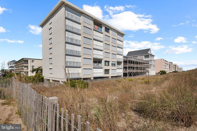 13700 Wight St Unit 1N01, Ocean City, MD 21842 - view of building exterior with fence