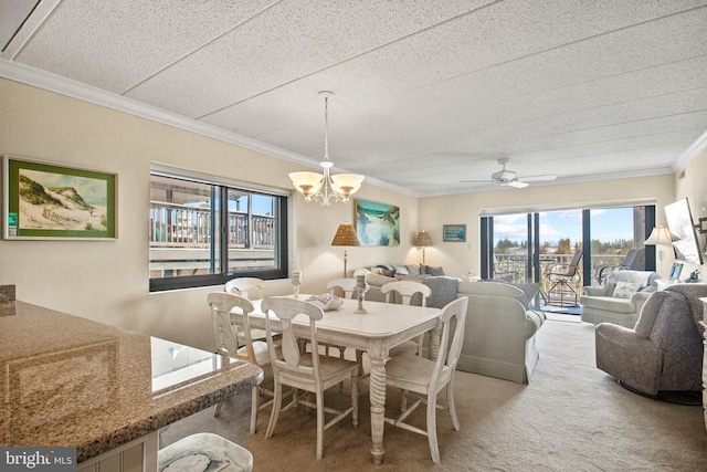 13700 Wight St Unit 1N01, Ocean City, MD 21842 - dining space with ornamental molding, carpet, and ceiling fan with notable chandelier