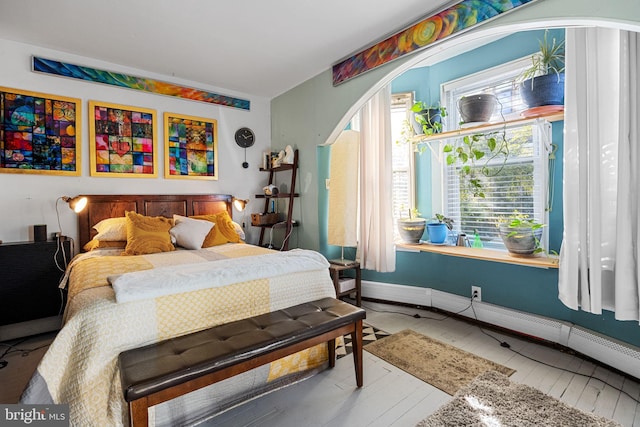 bedroom featuring hardwood / wood-style flooring