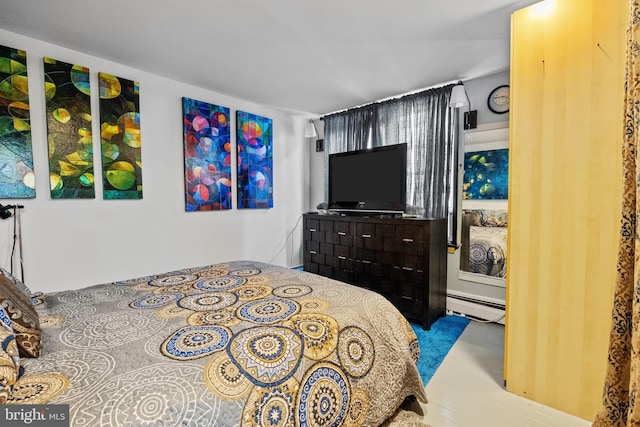 bedroom featuring a baseboard radiator