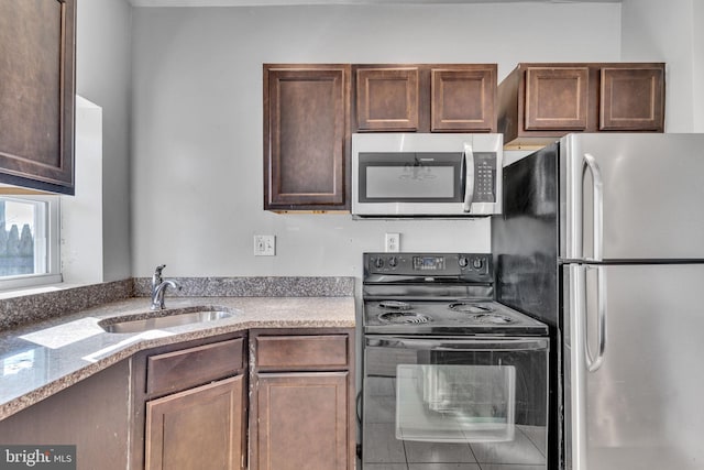 kitchen featuring sink and appliances with stainless steel finishes