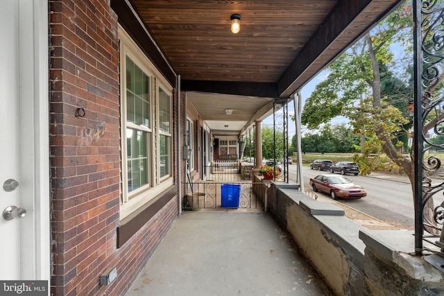 view of patio featuring a porch