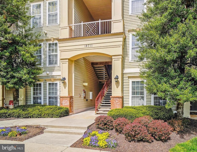 property entrance with a balcony