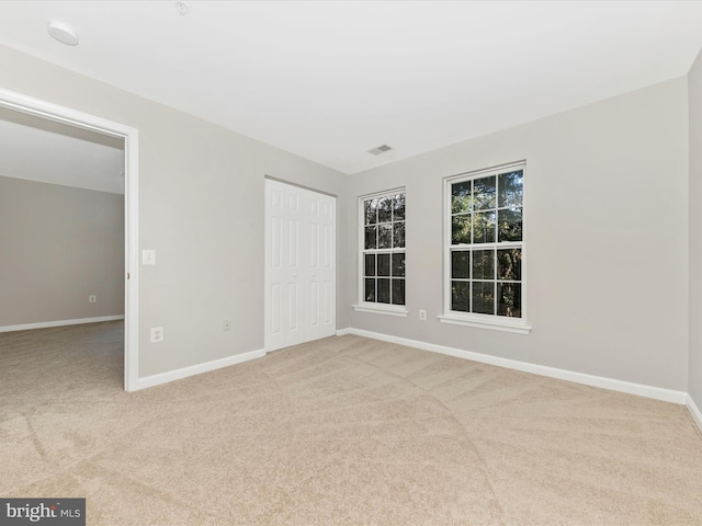 view of carpeted spare room