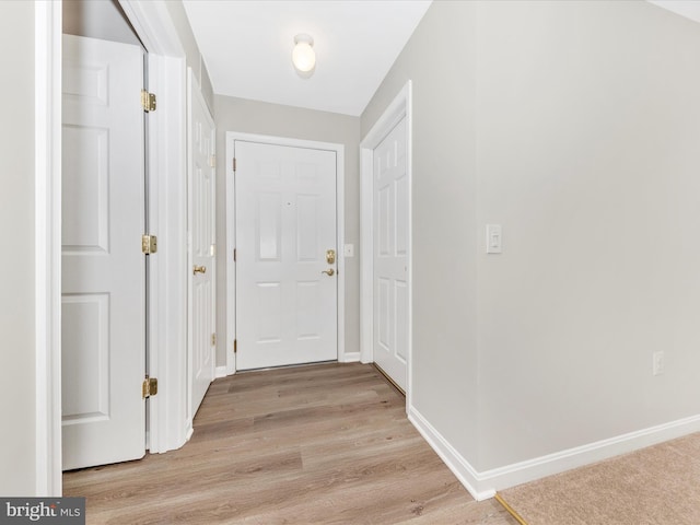 hall featuring light hardwood / wood-style floors