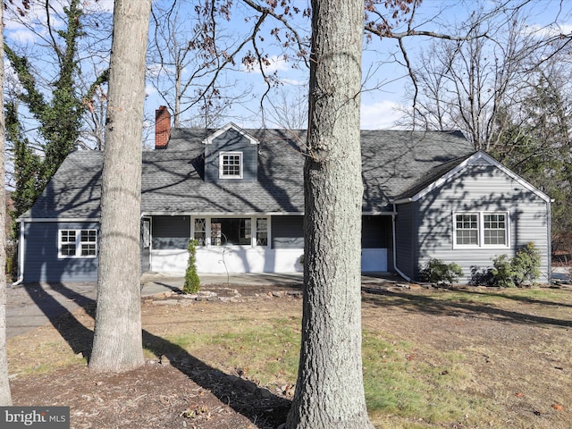 view of cape cod-style house