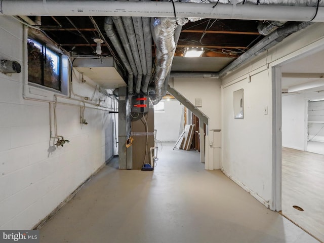 basement featuring heating unit