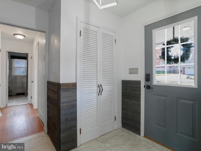 entryway with light hardwood / wood-style floors