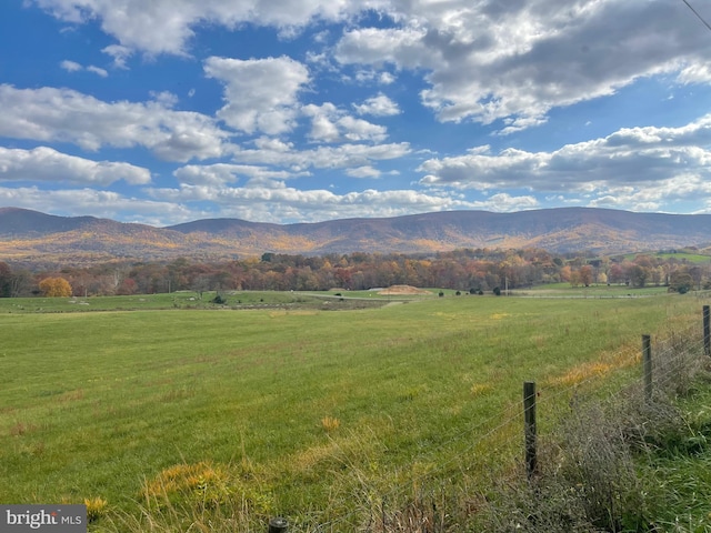 view of mountain feature featuring a rural view