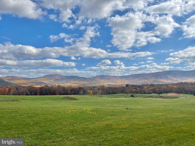 property view of mountains featuring a rural view