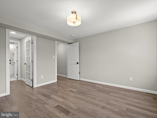 unfurnished bedroom featuring light hardwood / wood-style floors