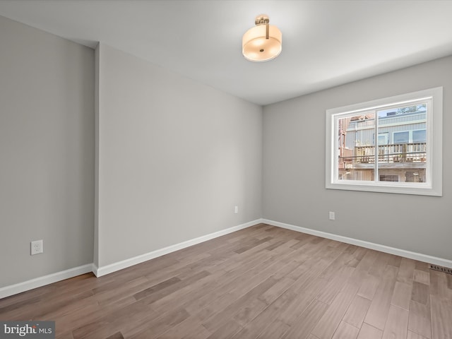 empty room featuring light hardwood / wood-style floors