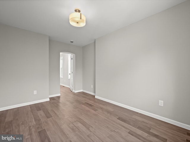 spare room with light hardwood / wood-style floors