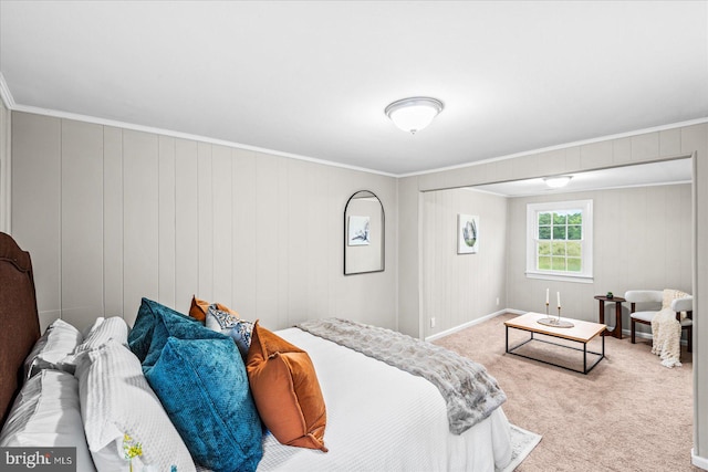 bedroom with light carpet, wooden walls, and ornamental molding