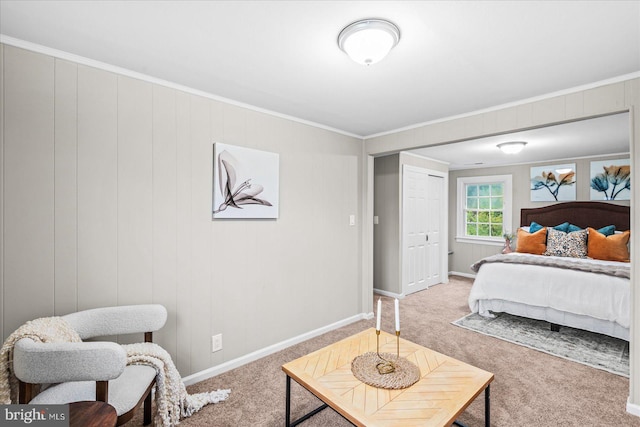 bedroom with carpet floors and ornamental molding