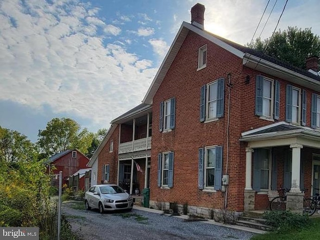 view of home's exterior with a porch