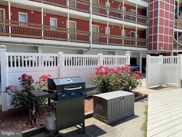 exterior space with a balcony and area for grilling