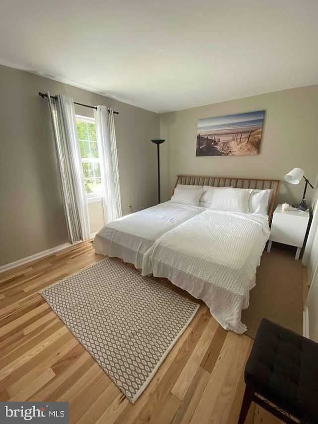 bedroom featuring light hardwood / wood-style floors