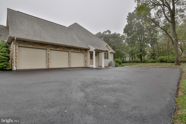 view of property exterior featuring a garage