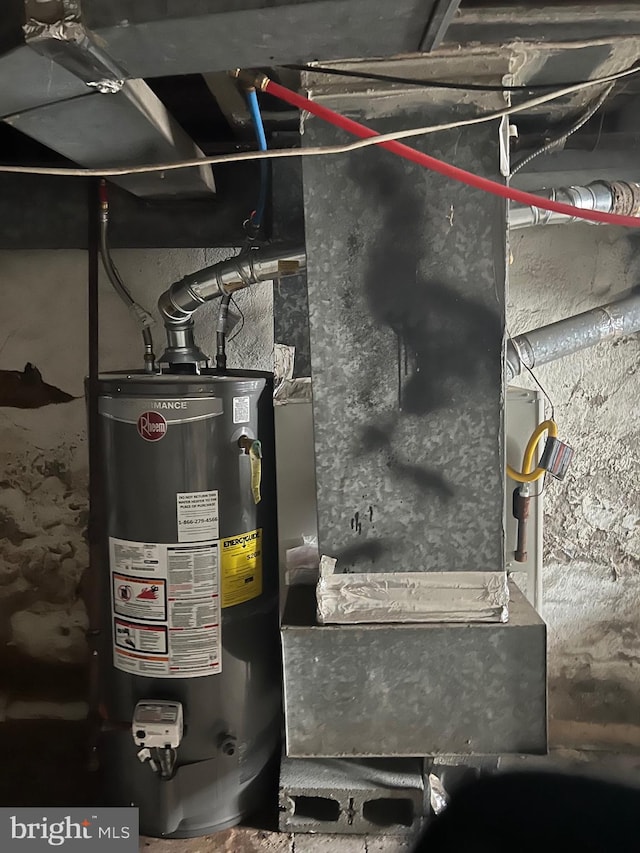 utility room with water heater