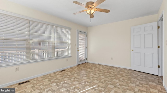 empty room with ceiling fan