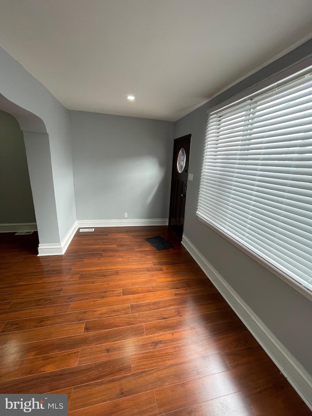 interior space featuring dark wood-type flooring