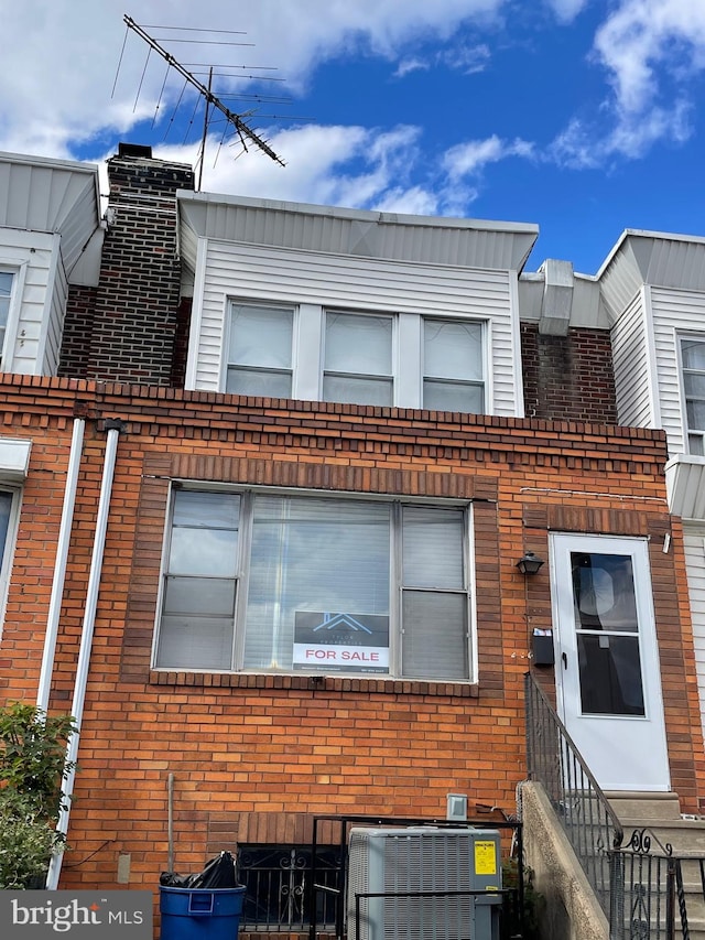 view of front of property featuring central AC