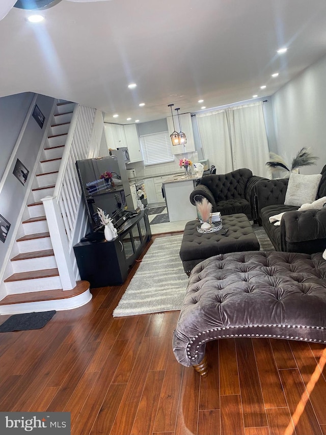 living room featuring dark hardwood / wood-style floors