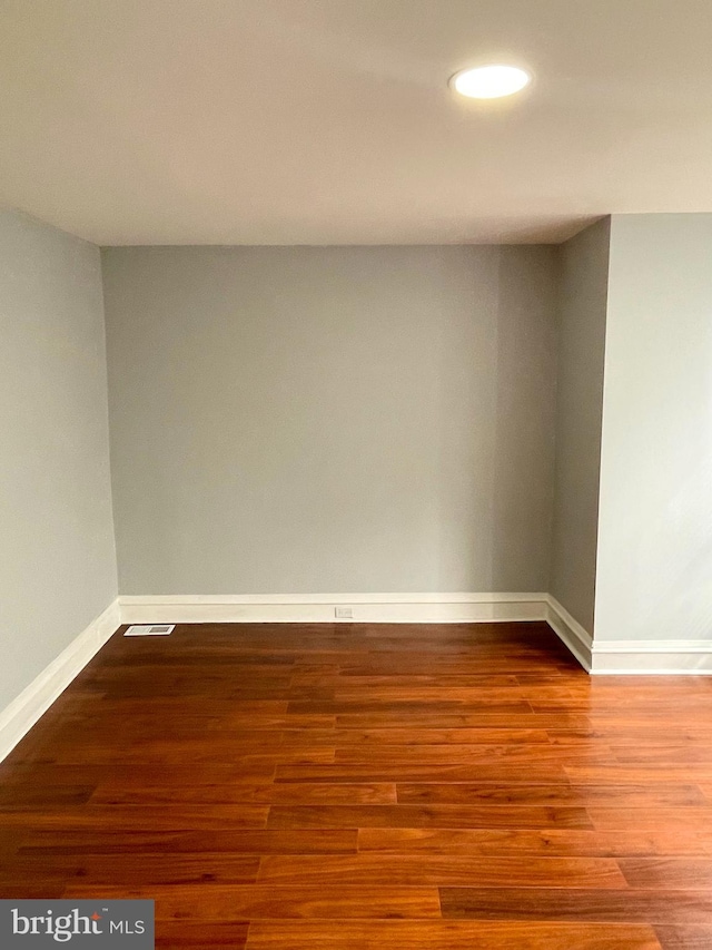 empty room featuring hardwood / wood-style floors