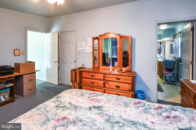 carpeted bedroom featuring crown molding