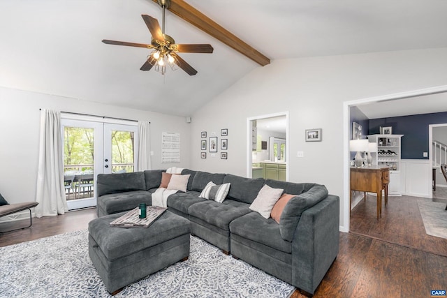 living room featuring vaulted ceiling with beams, ceiling fan, dark hardwood / wood-style flooring, and french doors