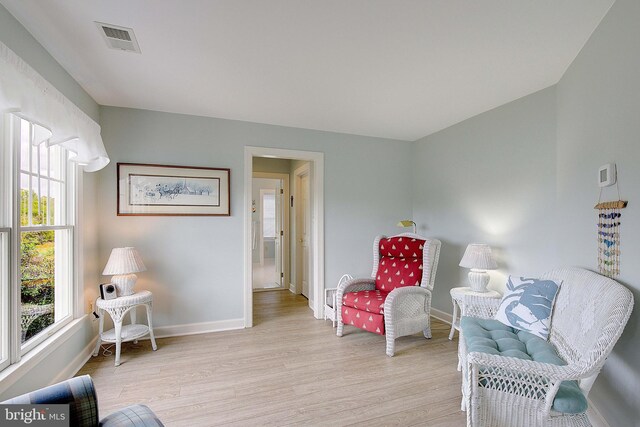 living area featuring light hardwood / wood-style flooring