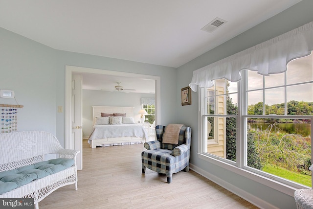 bedroom with light hardwood / wood-style floors