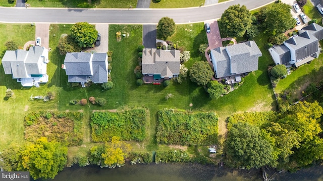 drone / aerial view with a water view