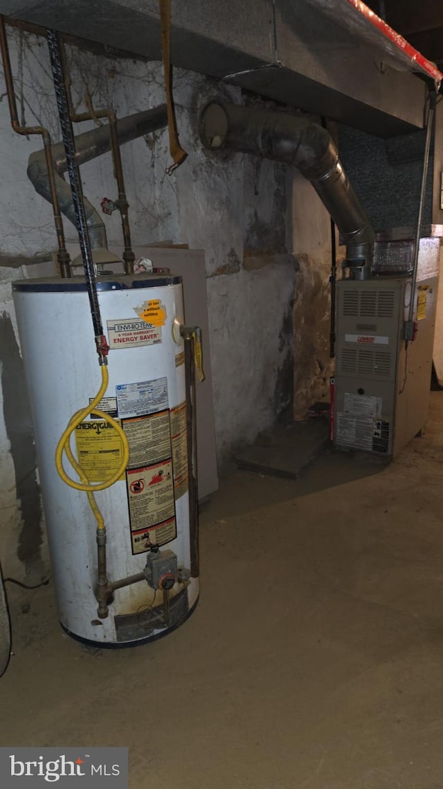 utility room with gas water heater