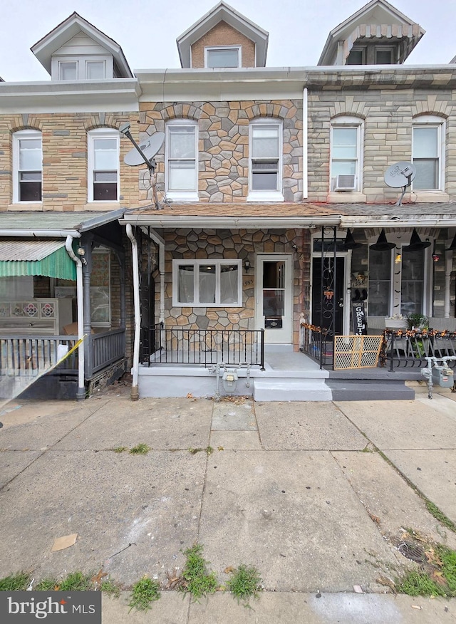 multi unit property with cooling unit and covered porch