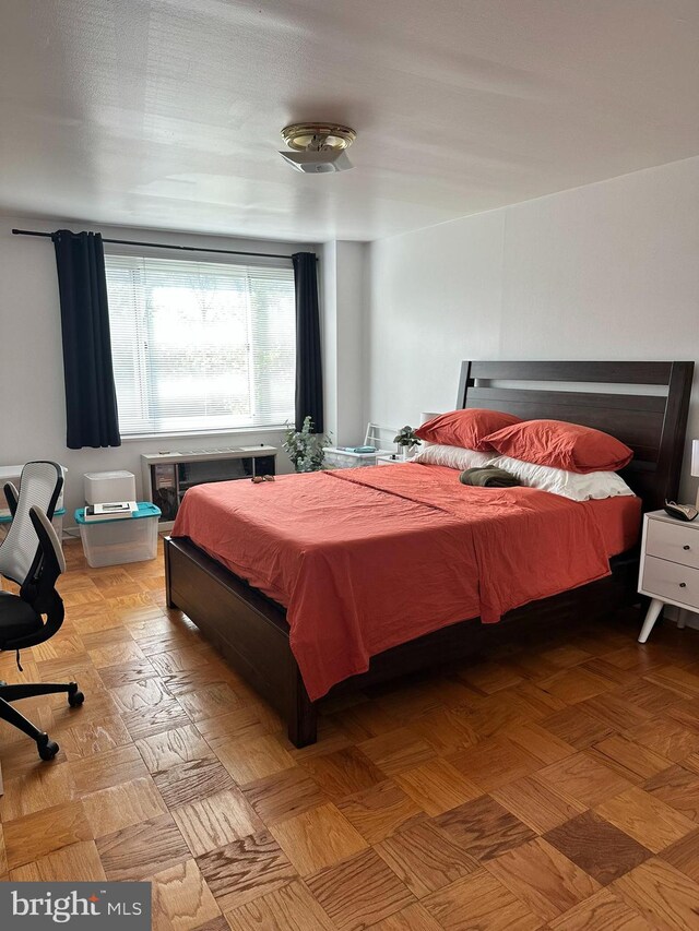 bedroom featuring light hardwood / wood-style floors