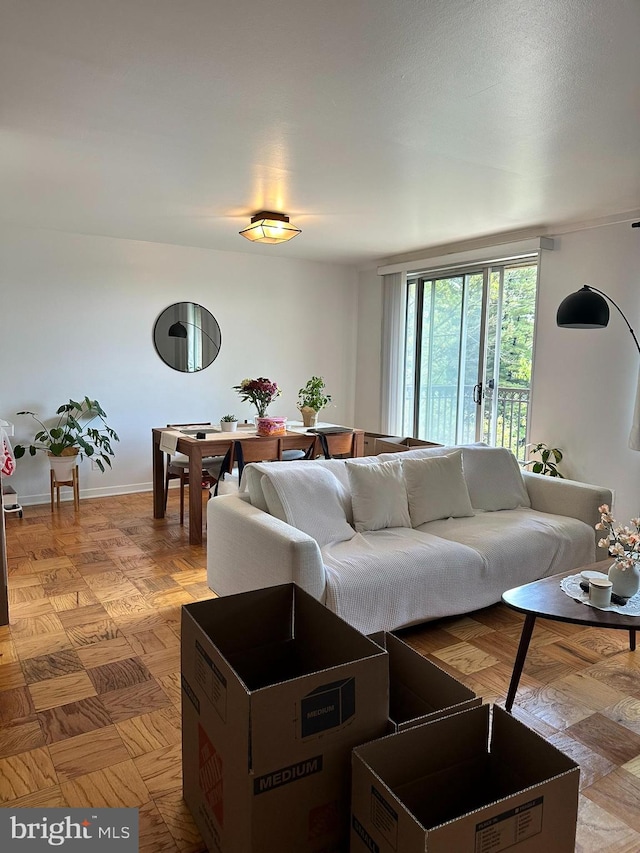 living room featuring light parquet floors