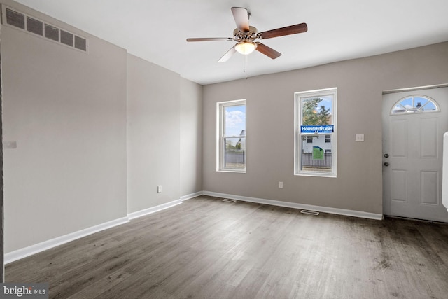 entrance foyer with wood-type flooring and ceiling fan