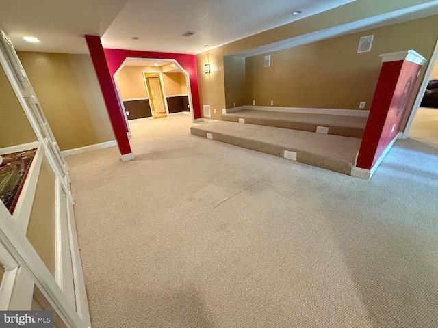 interior space with light colored carpet