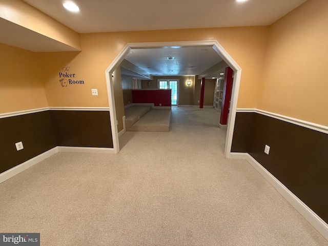 hallway featuring carpet