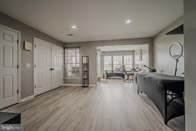 foyer entrance with light hardwood / wood-style floors