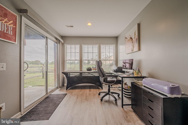 office space featuring light wood-type flooring